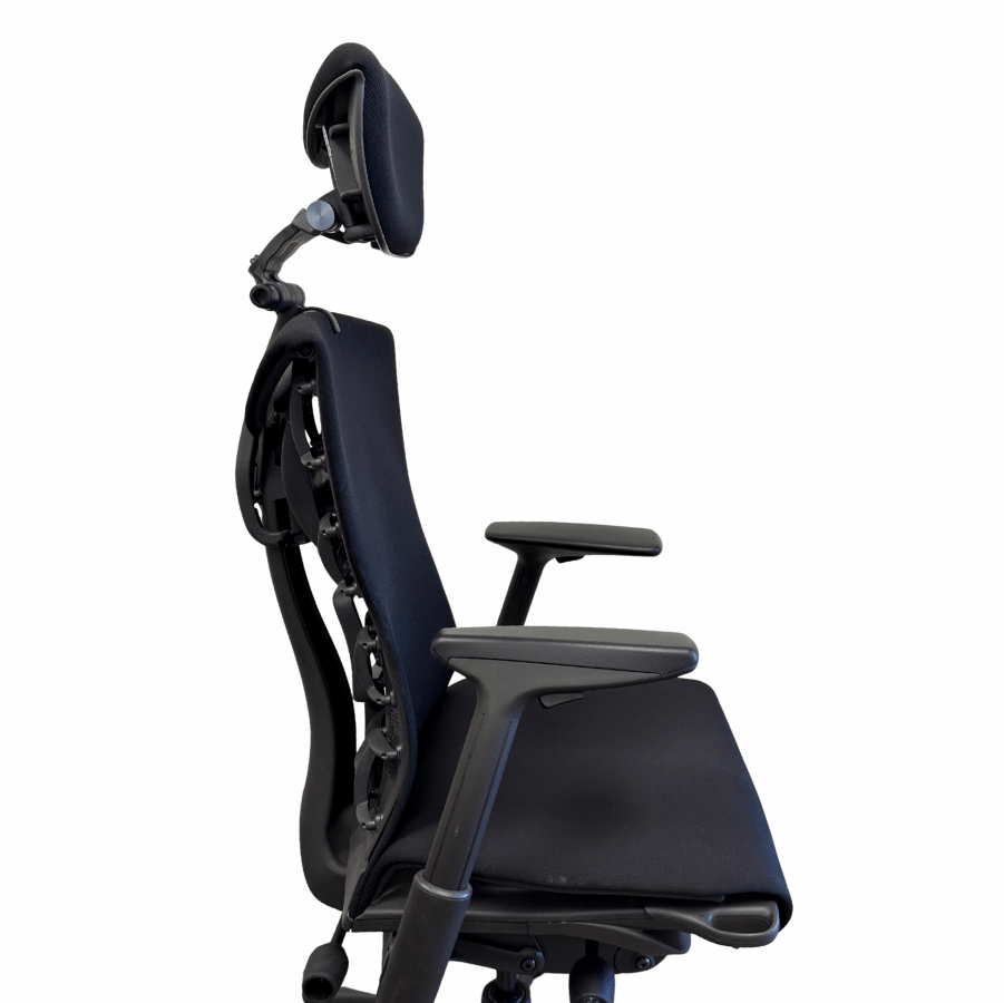 Side view of Herman Miller Embody chair with adjustable headrest, black ergonomic office seating