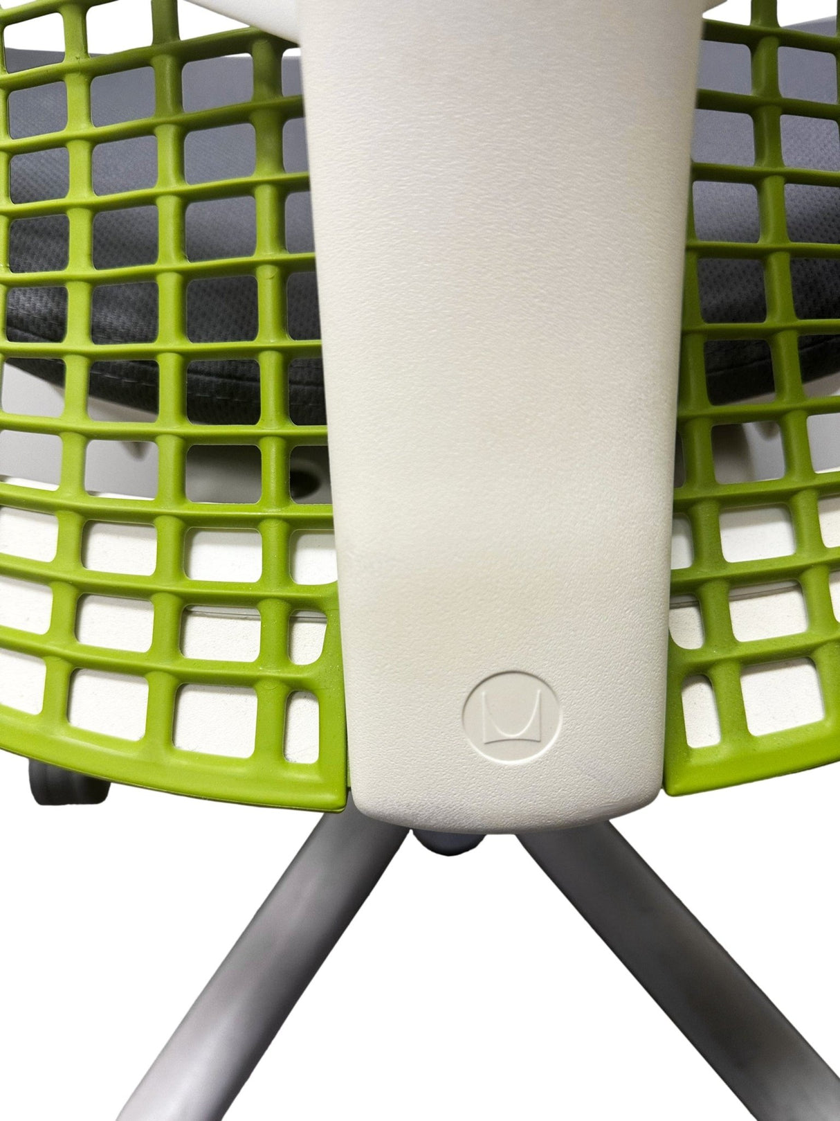 Close-up of Herman Miller Sayl chair green mesh back and white frame, refurbished office chair