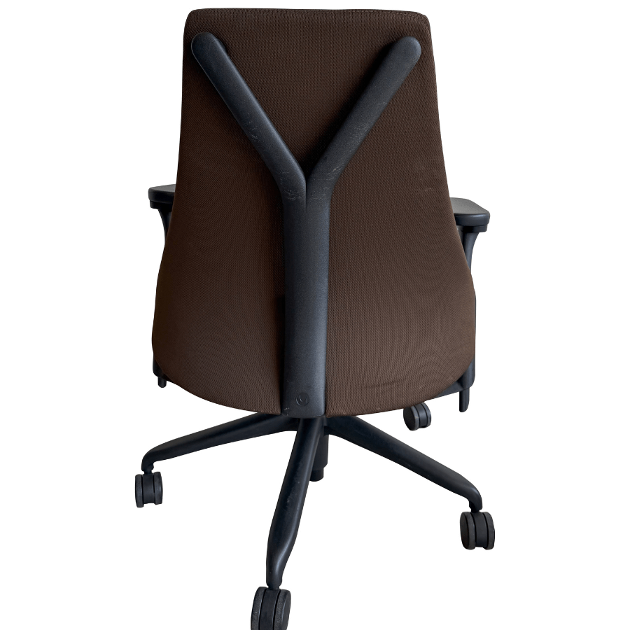 Back view of a refurbished Herman Miller Sayl office chair with brown mesh and Y-shaped support