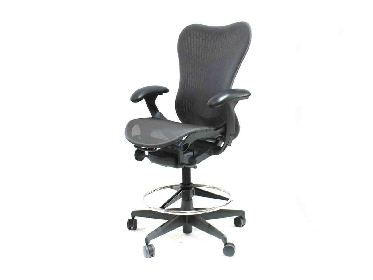 Refurbished Herman Miller Mirra 2 stool, black mesh ergonomic office chair with adjustable arms and foot ring, sold by Office Logix Shop.