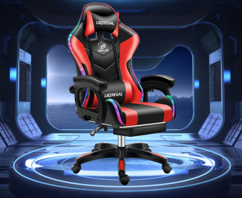 Red and black gaming chair with LED lights, adjustable arms, and massage lumbar support, displayed in a futuristic room.