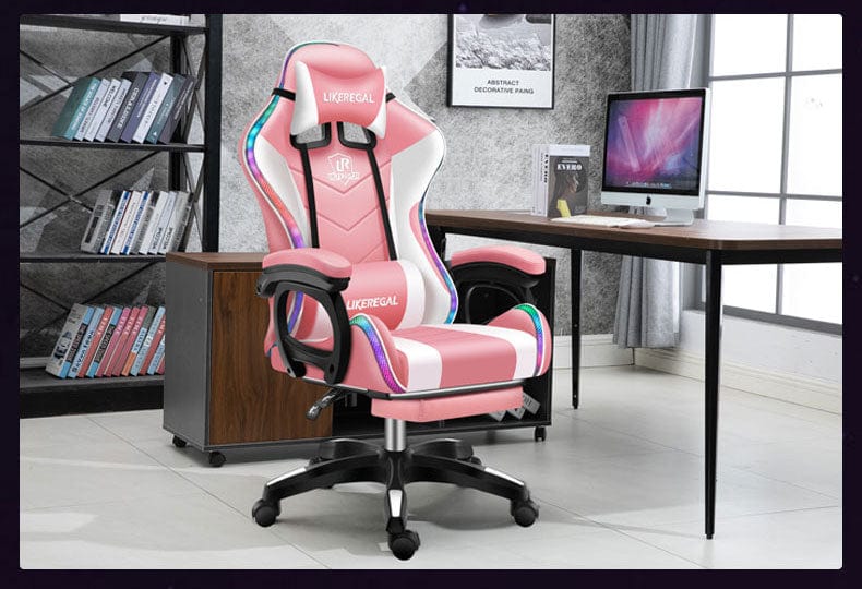 Pink gaming office chair with LED lights and massage lumbar support in modern workspace