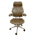 Refurbished brown leather Humanscale Freedom office chair with headrest on wheels